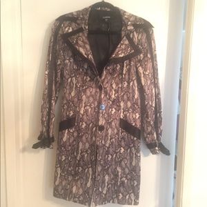 Bebe, detailed trench coat, size small. Almost new